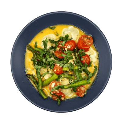 Ravioli w_ tomatoes, asparagus, Garlic, and herbs